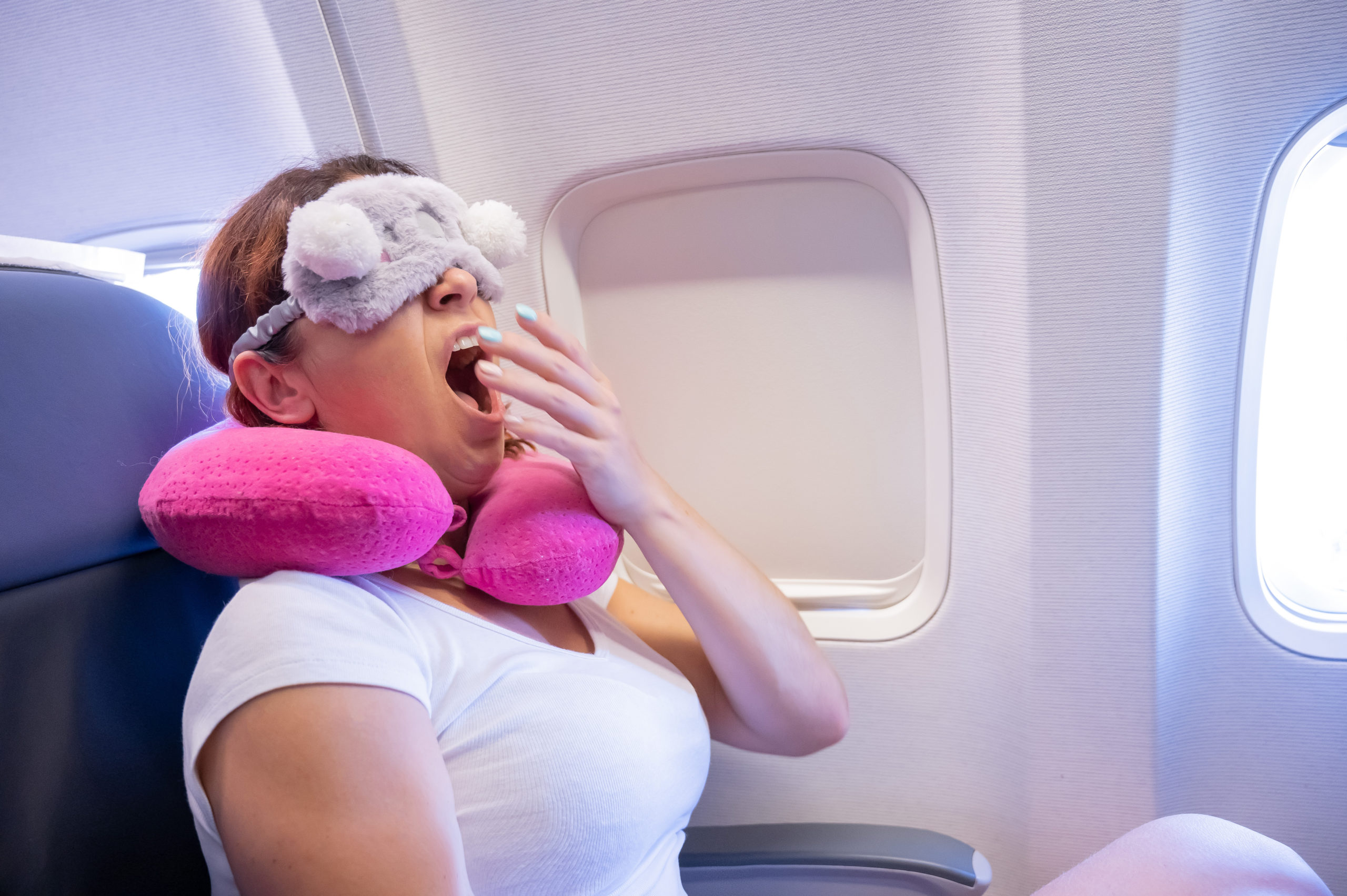 Miten nukkua lentokoneessa
